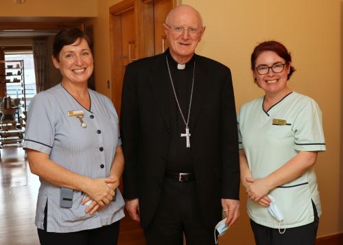 Archbishop Dermot Farrell with staff of St Francis Hospice Dublin